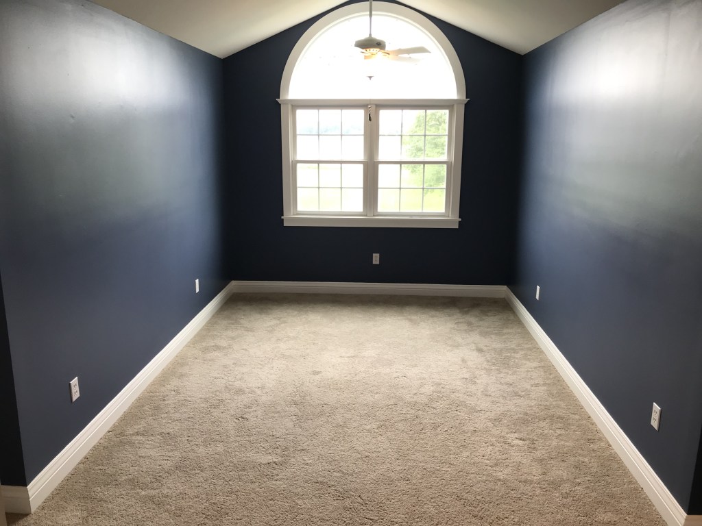 Upstairs room finished being painted blue. 